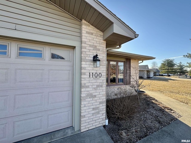 property entrance with a garage