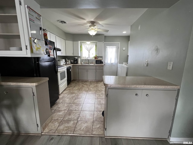 kitchen with white cabinetry, ceiling fan, washer and clothes dryer, and white range with electric cooktop