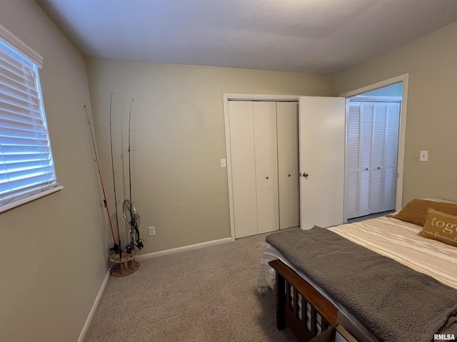 bedroom with a closet and carpet