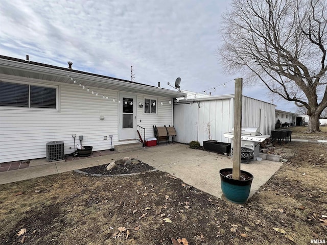 back of property with central air condition unit