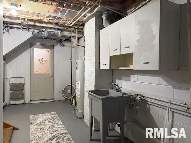 basement featuring water heater