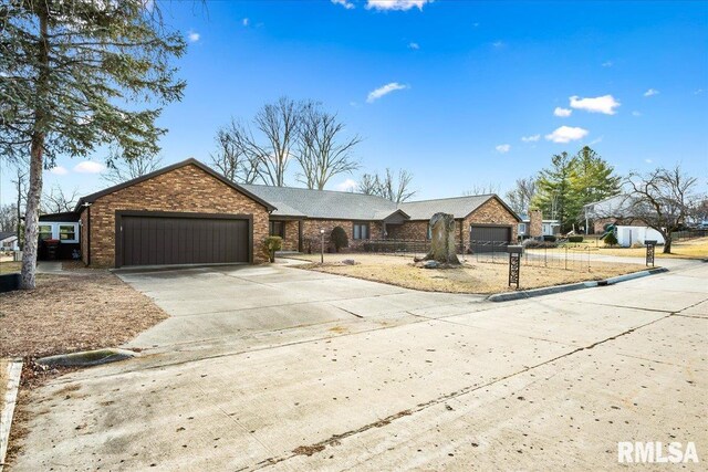 ranch-style home with a garage