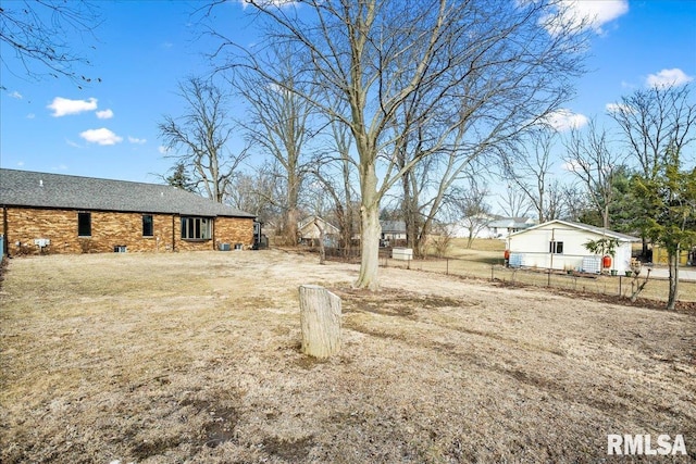 view of yard featuring fence