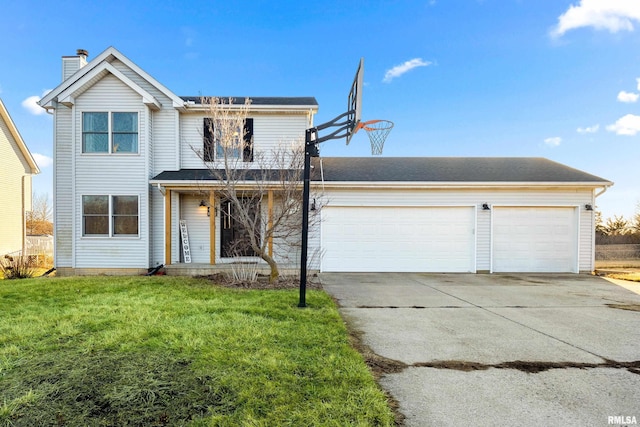 front facade with a garage and a front lawn