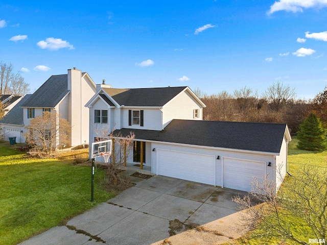 front of property featuring a garage and a front lawn