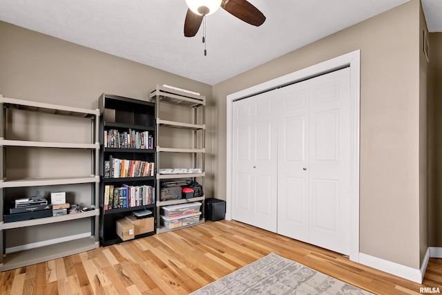 interior space featuring ceiling fan and hardwood / wood-style floors