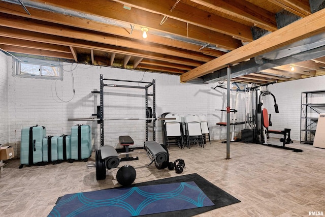 exercise area with brick wall