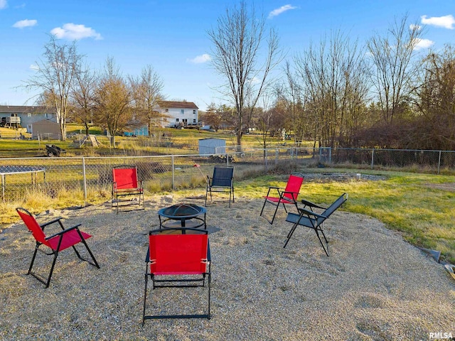 view of patio / terrace with an outdoor fire pit