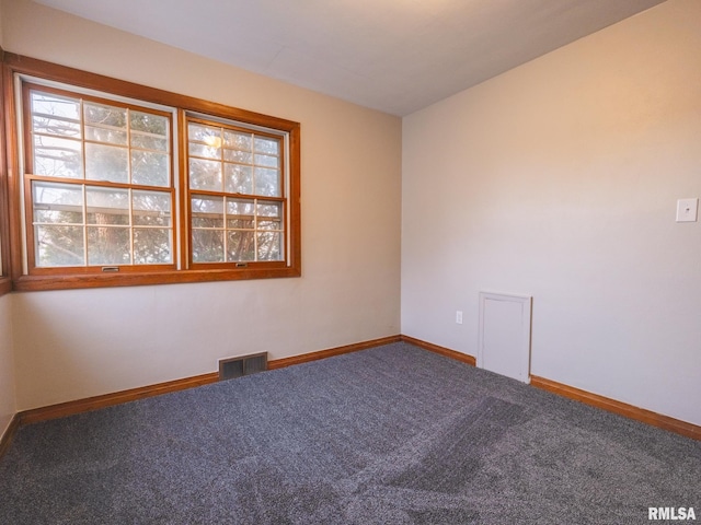 unfurnished room featuring carpet floors