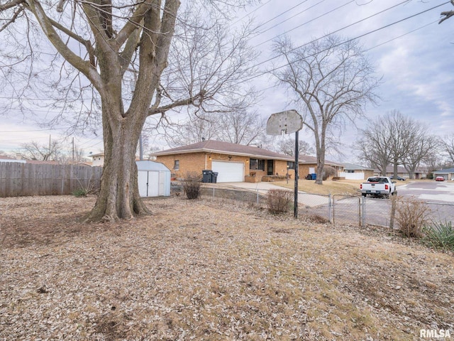 view of yard featuring a garage