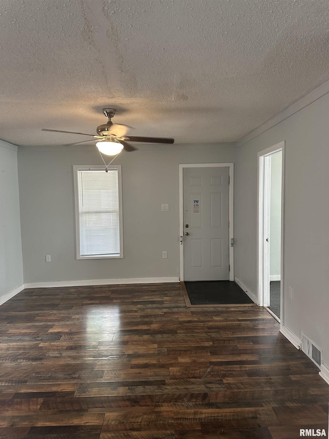 1822 N Sheridan Rd, Peoria, IL 61604 - foyer entrance featuring dark wood-type flooring, ceiling fan, a textured ceiling, and baseboards