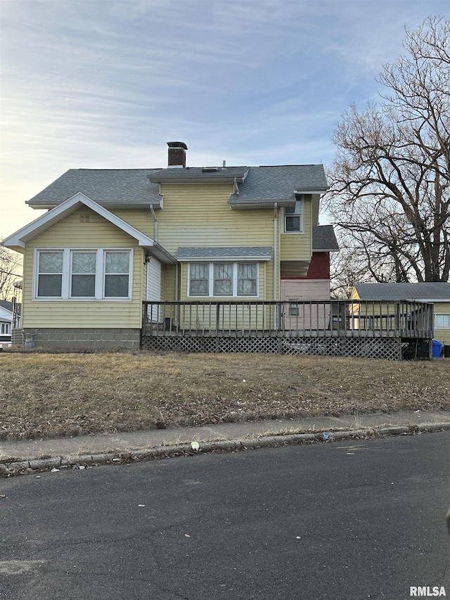 view of front of property featuring a deck