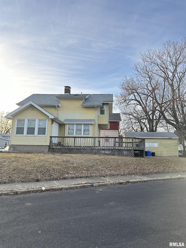 view of front facade with a deck