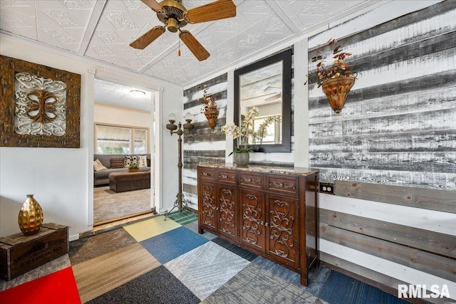 hallway featuring ornamental molding