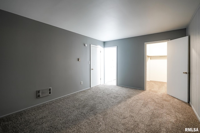 empty room featuring carpet flooring