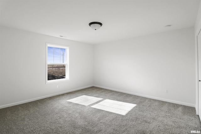 view of carpeted spare room