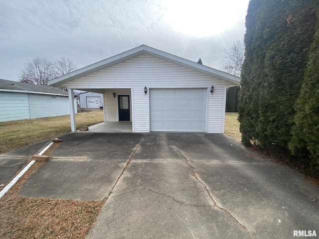 view of front of property with a garage and a carport