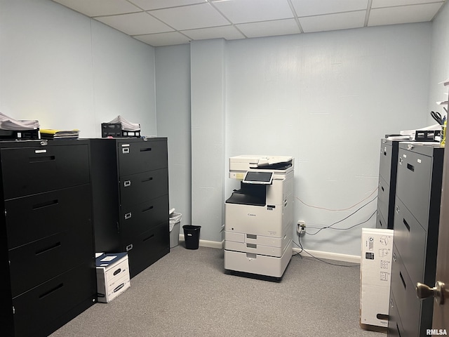 misc room featuring light colored carpet and a drop ceiling