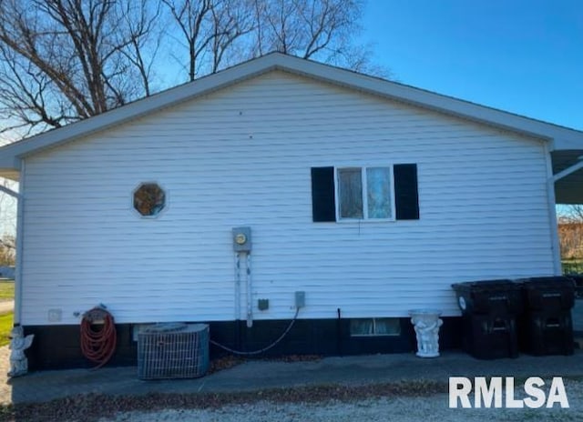 view of home's exterior featuring central AC