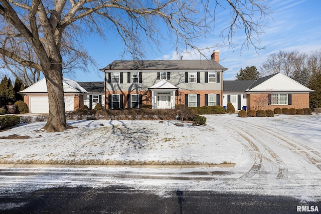 colonial house featuring a garage