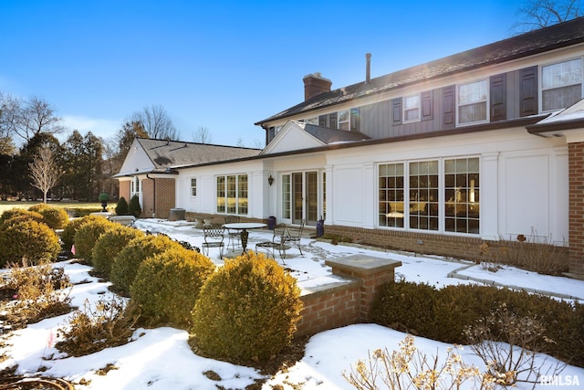 view of snow covered property