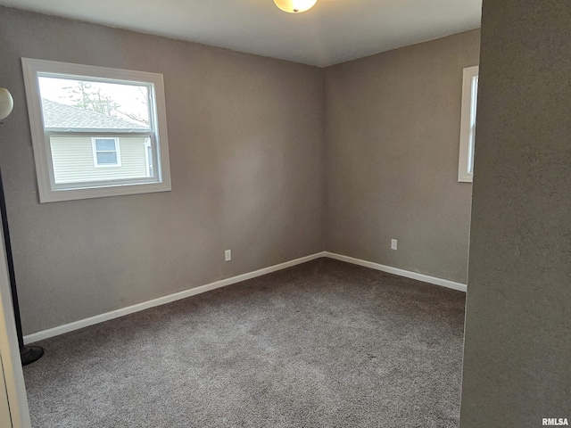 104 Parkway Dr, Carthage, IL 62321 - carpeted spare room featuring baseboards