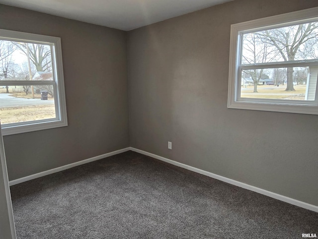 104 Parkway Dr, Carthage, IL 62321 - empty room with carpet flooring and baseboards