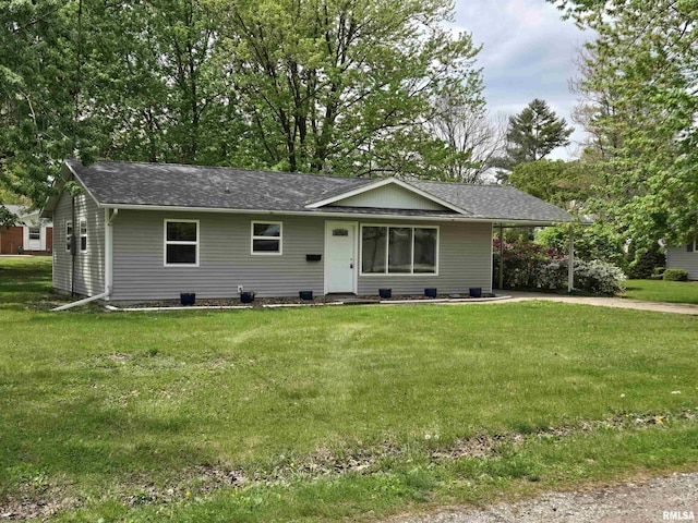 104 Parkway Dr, Carthage, IL 62321 - ranch-style home featuring concrete driveway, a front lawn, and a carport