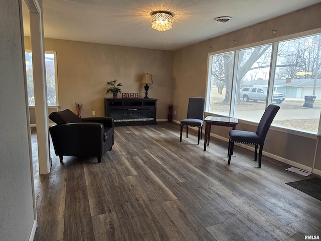 104 Parkway Dr, Carthage, IL 62321 - sitting room featuring dark wood-type flooring and baseboards