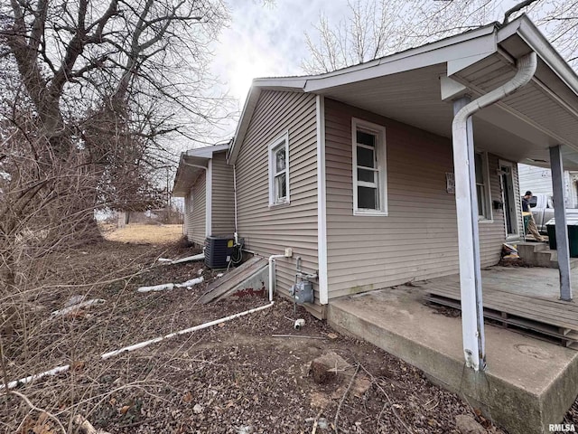 view of side of property featuring cooling unit