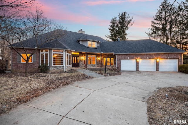 view of front of home with a garage