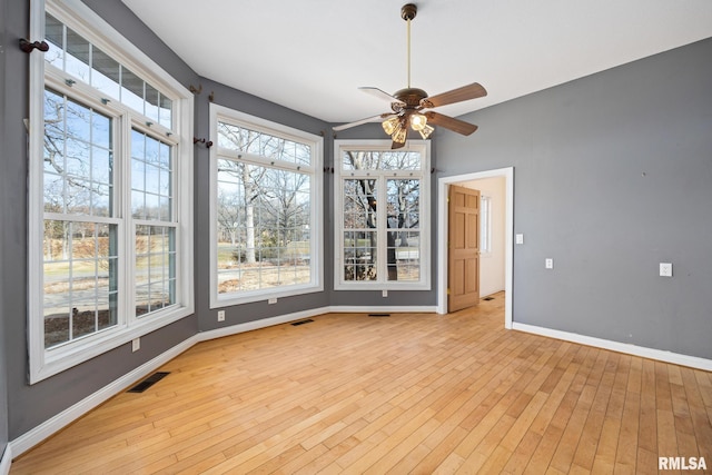 interior space featuring ceiling fan