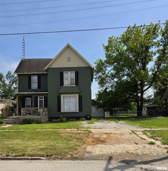 207 W Main St, La Harpe, IL 61450 - view of traditional-style home