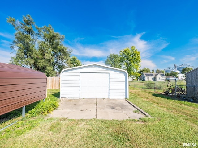 garage with a yard