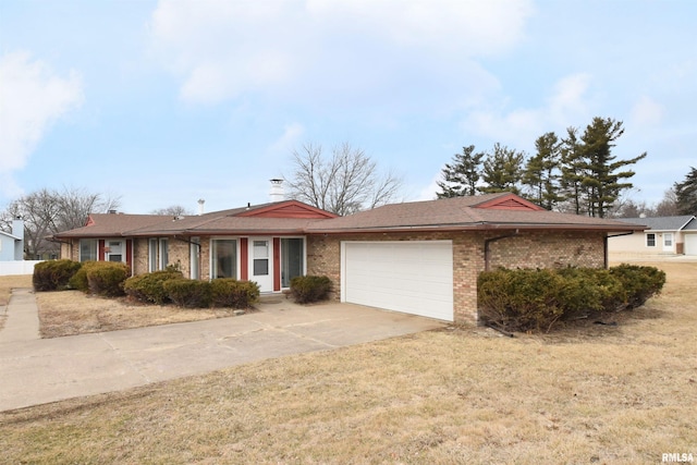 ranch-style house with a garage and a front yard