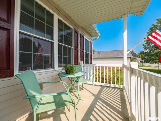 balcony featuring a porch