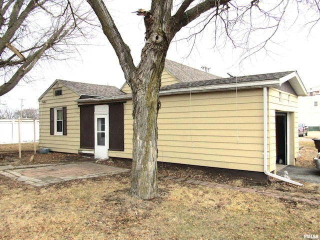 view of property exterior with a garage