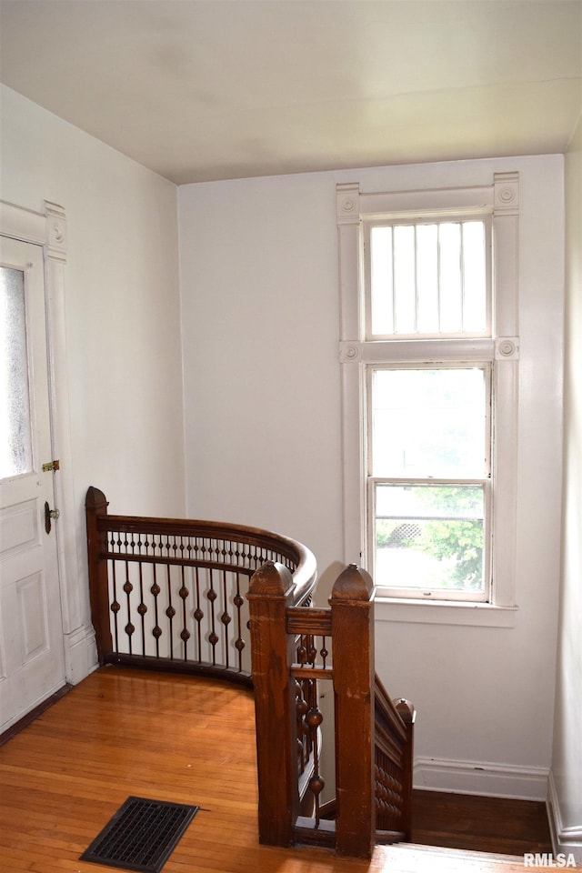 bedroom with wood-type flooring