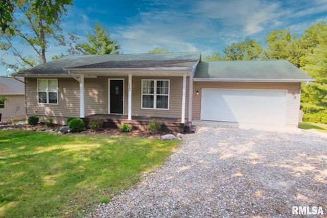 single story home with a garage, a porch, and a front lawn