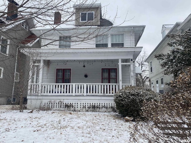 view of front of home featuring covered porch