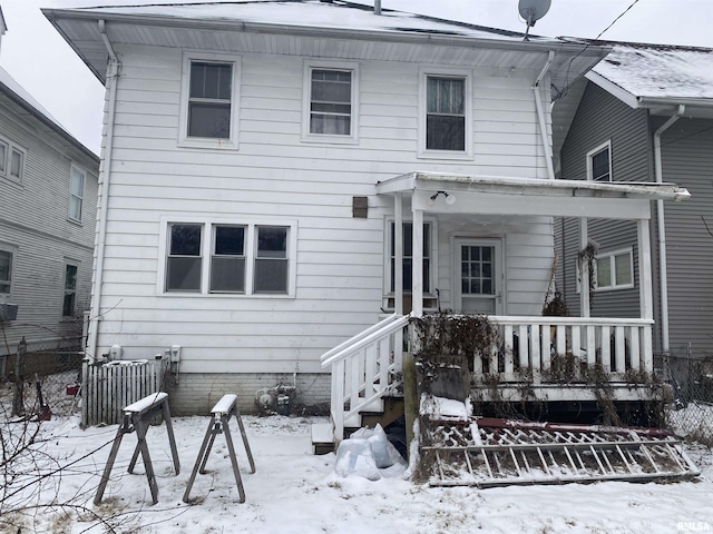 view of snow covered property