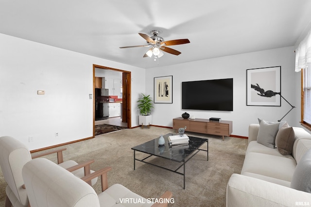 living room with ceiling fan and light carpet