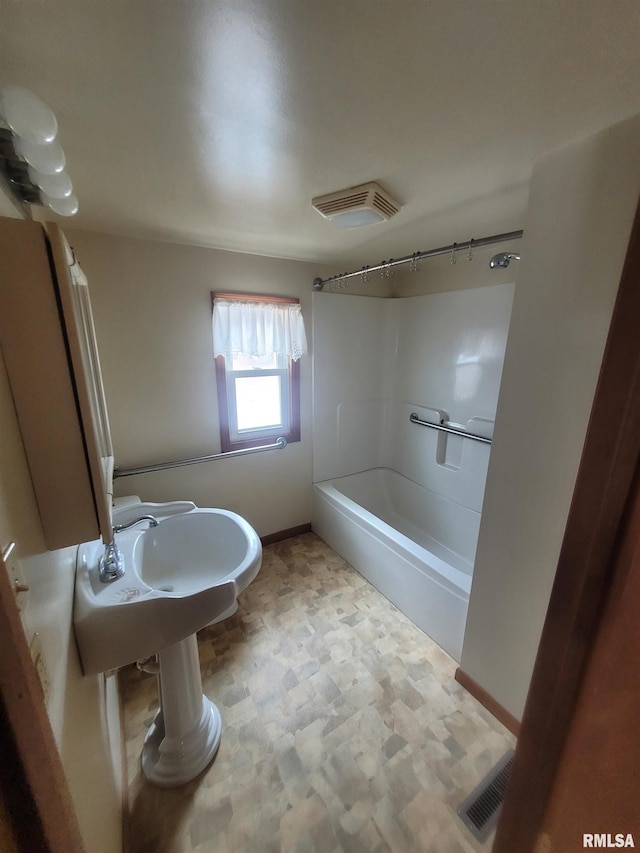 bathroom featuring bathing tub / shower combination