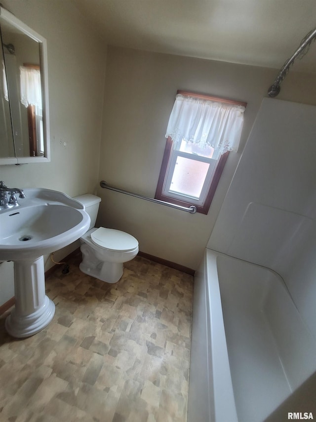 bathroom featuring toilet