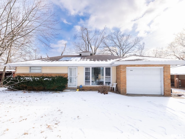 single story home featuring a garage