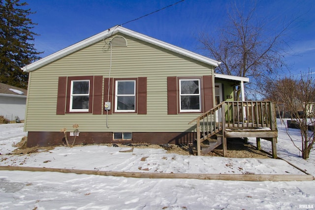 view of snow covered property