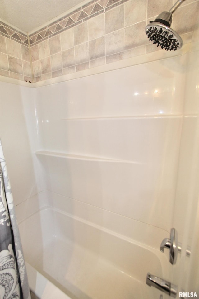 bathroom with shower / bathtub combination with curtain