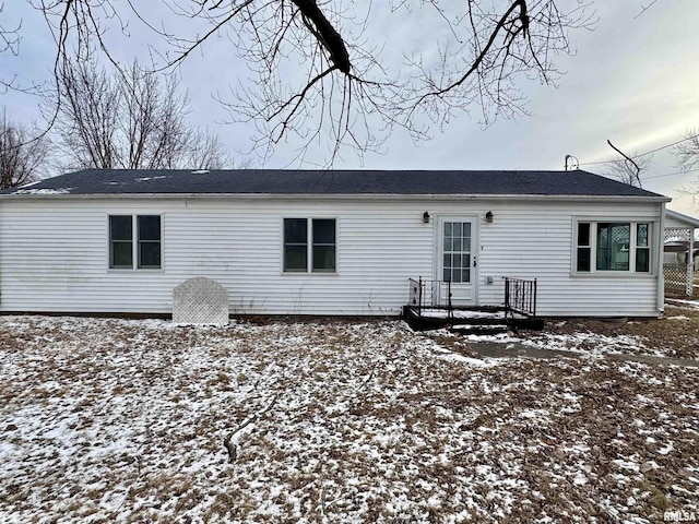 view of snow covered property