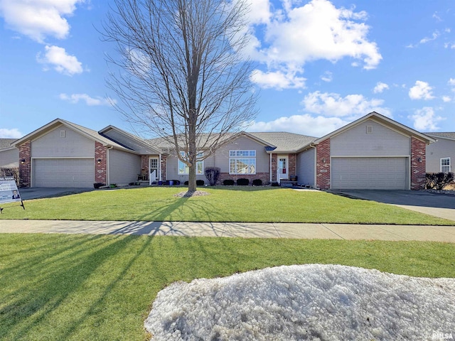 ranch-style house with a garage, brick siding, driveway, and a front lawn