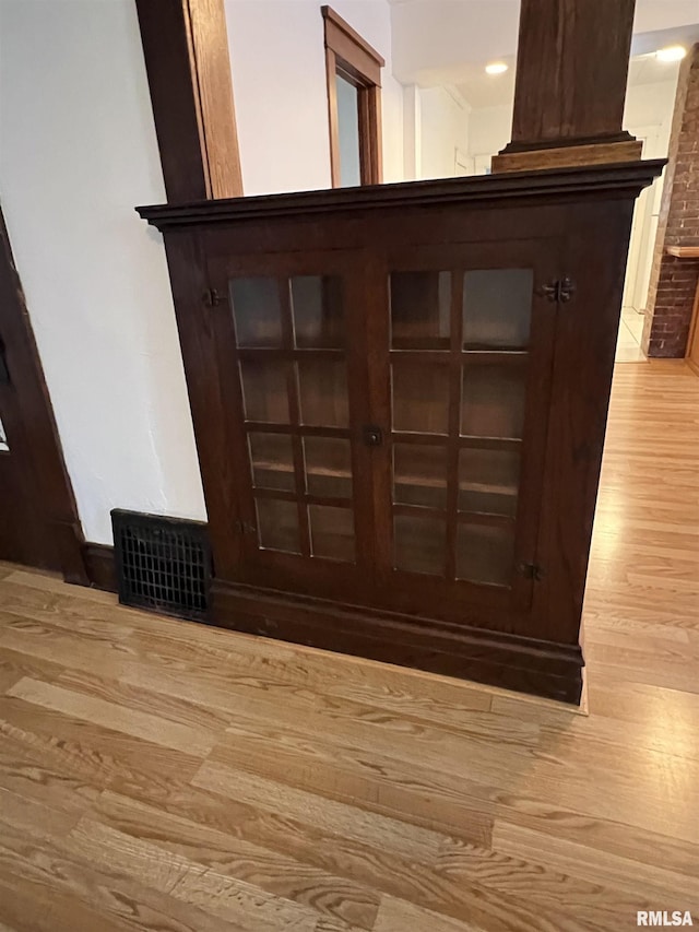 interior details featuring hardwood / wood-style floors